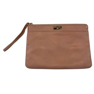 Cole Haan women's leather wristlet with strap in pink.